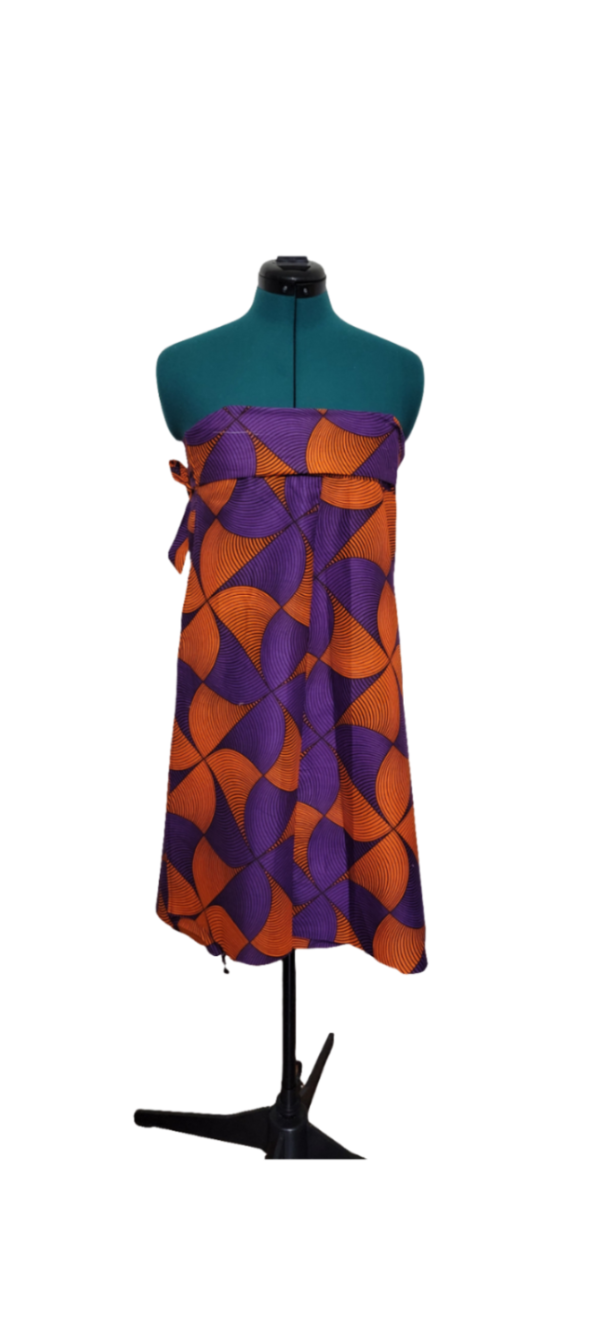 Purple and orange patterned dress on a mannequin against a white background